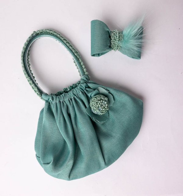 green purse with matching hair clip for little girls