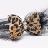 Leopard print bow headband with black feathers and crystal detail for girls
