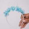 white bunny ears with faux pearl