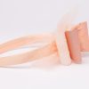Peach bow headband with sheer tulle layers and crystal detail for girls