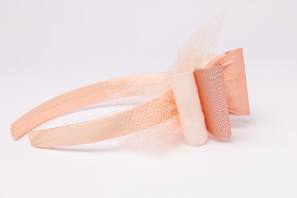 Peach bow headband with sheer tulle layers and crystal detail for girls