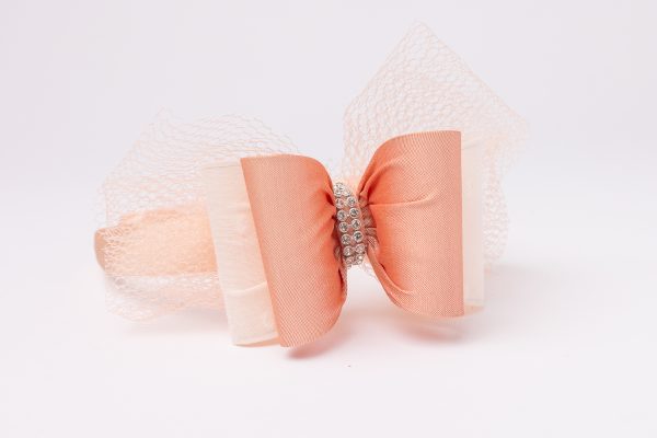 Peach bow headband with sheer tulle layers and crystal detail for girls