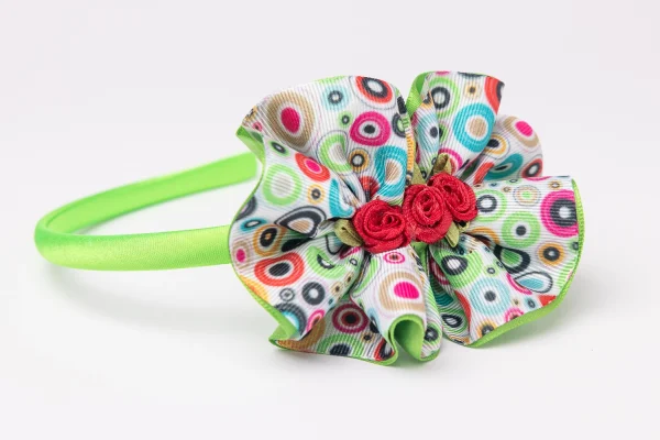 Colourful ruffle flower headband with red rosette centre
